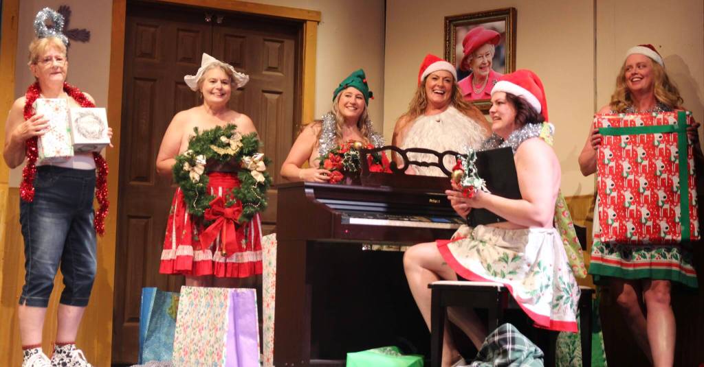 Friends pose topless in Christmas outfits for their Womens Institute calendar photoshoot. From left are Rusty Hendrix (Jessie), Lisa Judd (Ruth), Erin Martin (Annie), Katie Jones (Chris), Jade Parmenter (Cora) and Lora Beth Eelkema (Celia)