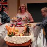 Lora Beth Eelkea, as Celia, covers up with some carefully placed douhgnuts. Celia and her best friends are fundraising by participating in a nude calender photoshoot.