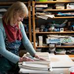 StillFire Pottery’s Carol Ann Bauer forms platters out of clay at her home on Tuesday, March 11, 2025 in Freeland, Washington. (Olivia Vanni / The Herald)