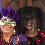 Suzanne Ashworth and Naomi Schneider wear Halloween masks at Fridas.