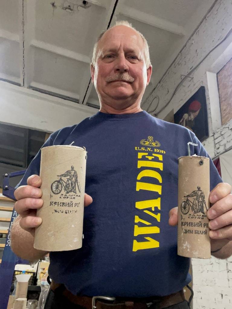 Anacortes resident John Faught in the smoke grenade shop in Ukraine, which was originally the Iron 100 Bicycle Club. (Photo provided)