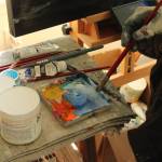 (Photo by Allyson Ballard) Haslet used a small palette and worked slowly, guided by a reference image on his phone.