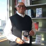 (Photo by Marina Blatt) Douglass Shaw smiles with a copy of his latest book, Curative Culture.