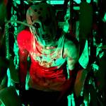 A masked lunatic lies in wait inside the corn during Frightnight. (Photos by Sarah Bellis)