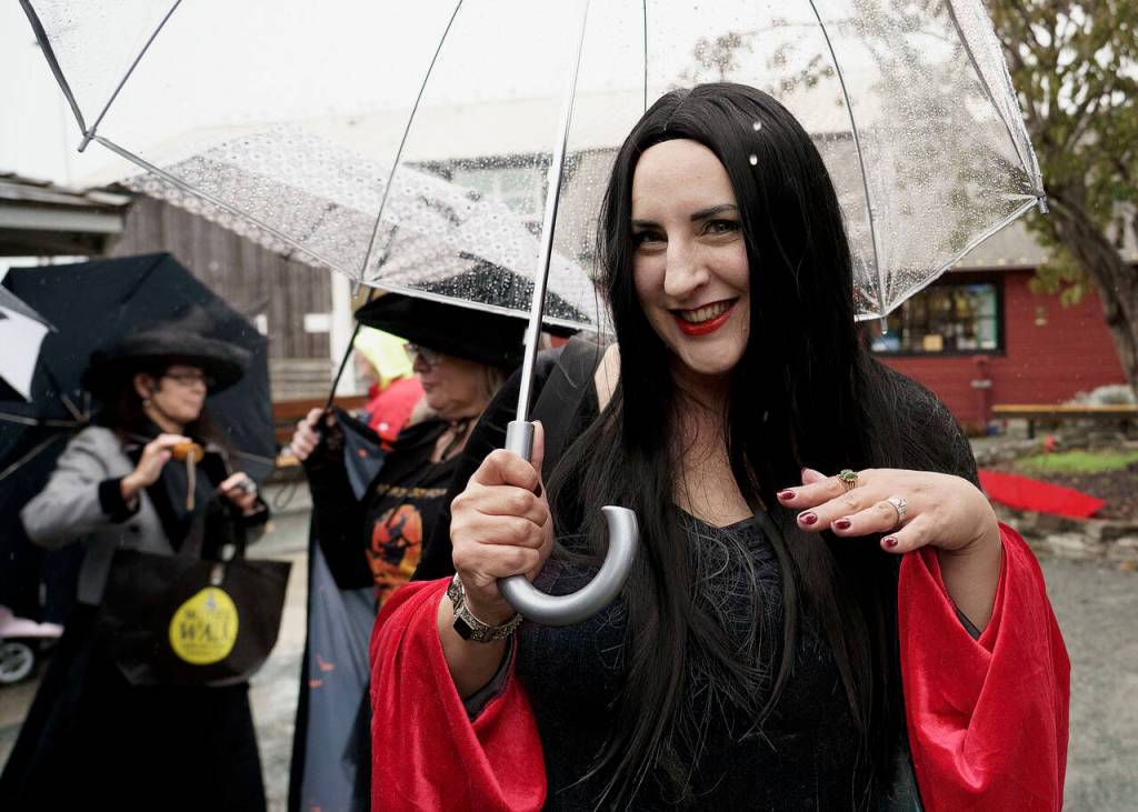 Emily Harding Hill bewitched as Morticia Addams, flaunting the characters trademark sleek black hair. (Photo by David Welton)