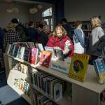 (Photo by David Welton) Patrons peruse the collection at the newly renovated Langley Library during a reopening ceremony earlier this year.