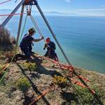 (Photo provided) A fire captain rapelled 100 feet down to save the dog.