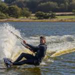 (Photo by Gary Skiff) Martin Anderson who lives in Seattle and takes every opportunity after work to ride the wind, kiteboards on Swan Lake.