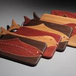 (Photo provided by Rob Schouten Gallery) A selection of hardwood cutting boards made by Bruce Laner.