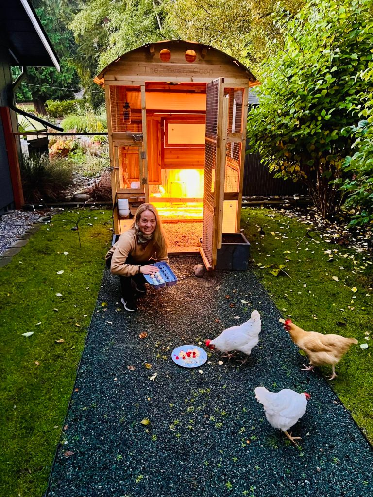 Jennifer Lovely smiles with her chickens. (Photo provided)