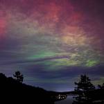 Randy Heiserman took this photo at Deception Pass. The sky dances with hues of pink and green.
