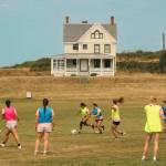 (Photo provided) Girls play soccer at Camp Casey last summer.
