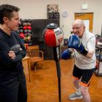 Bob Merry warms up while Dakota Stone looks on. (Photo by David Welton)