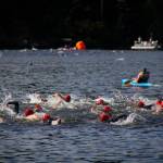 Whidbey Triathlon participants swim through Goss Lake in 2013.