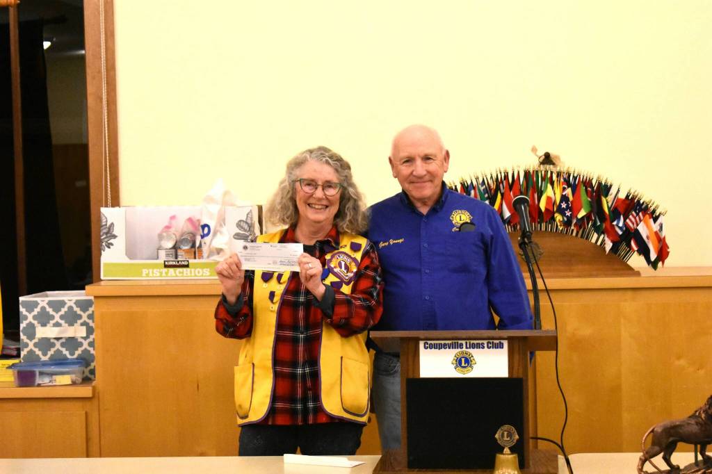 Photos provided. Coupeville Lion Cindy Van Dyk and Club President Gary Youngs announced the donation at a meeting on Wednesday, Nov. 19.