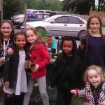 (Photo provided) House of Hope children gather to help with a garden project.