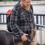 (Photo by David Welton) Loki leans into his mom, Cole, with affection, but really he is probably searching for treats.