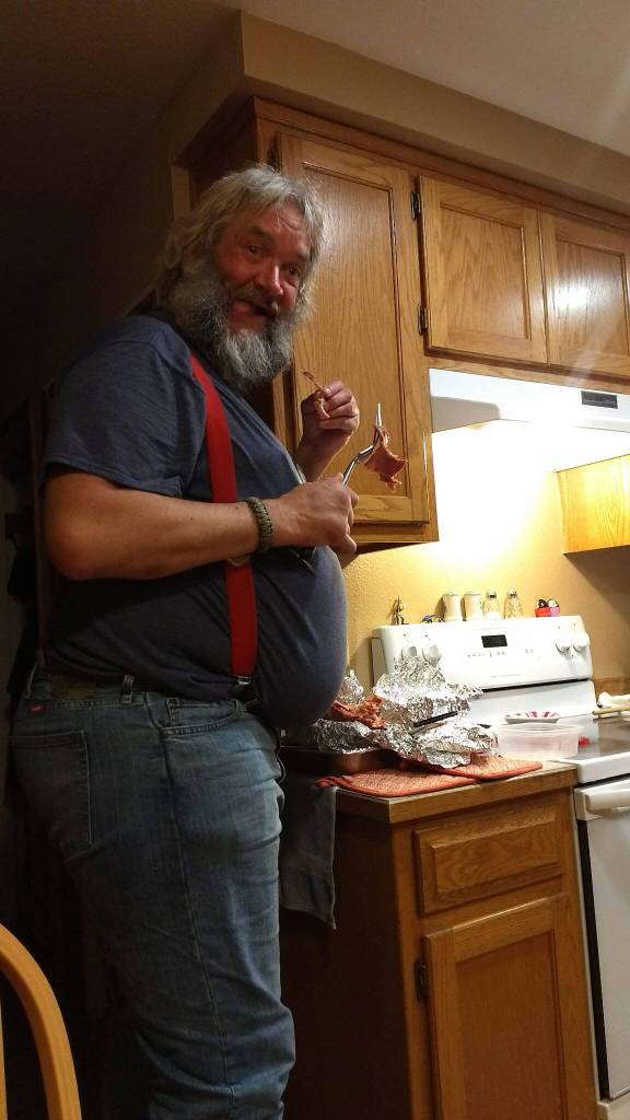 Jeff Pangburn snacks at his familys home.