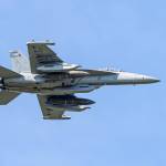 (Photo by Joe Kunzler) An EA-18G Growler with jamming pods flies over Whidbey Island.