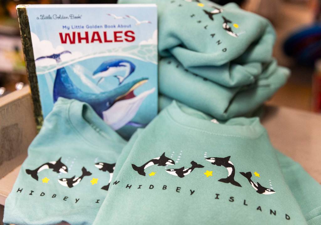 Whale shirts at The Star Store in Langley. (Olivia Vanni / The Herald)