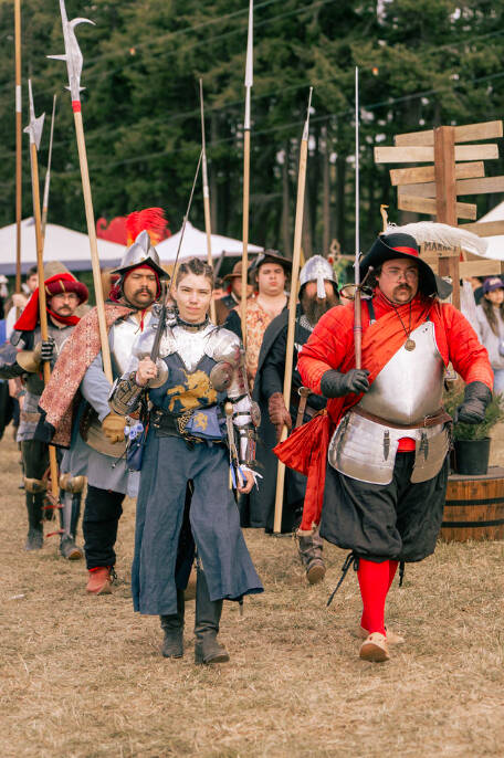 (Photo by Ted Warner Photography) Ren Faire performers make a dramatic entrance.