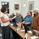Dominique Emerson is sworn in as a new member of the Langley City Council Monday night.