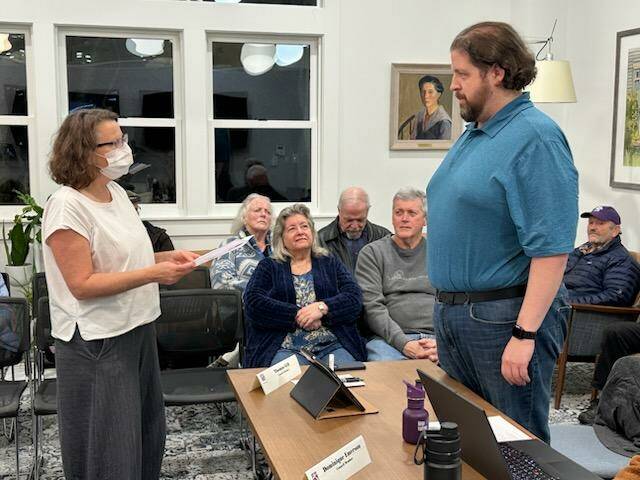 Thomas Gill is sworn in as a new member of the Langley City Council Monday night.