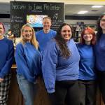 Photo provided. Island Pet Center staff, pictured here, held a retirement sale at the store on Monday.