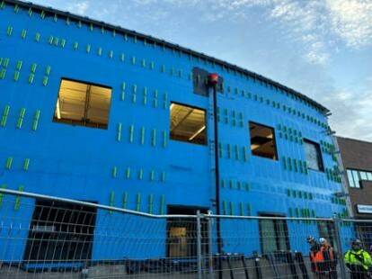 (Photo provided) Exterior siding and windows are in progress at the middle school and high school campus.