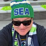 Mayor Ronnie Wright dons Seahawks colors.