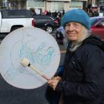 (Photo by Allyson Ballard) Deborah Koff-Chapin, a Langley resident, brings her drum to every protest she attends as a way to keep chants in time.