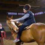 (Photo by David Welton) Jane Beau pets Gal and thanks her for the ride. Andrews stressed the importance of creating harmony with the horse as an equestrian vaulter.