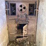 Photo by David Stern. Believed to be manufactured in 1912, this coal-burning furnace was recently discovered beneath the Pole Building.