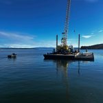 (Photo provided) The new dock was floated on a barge to the wharf, then installed with a crane.