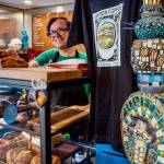 Photo by David Welton. Bryce Wills explains the scone offerings of the day to a customer at Jupiter Coffee in Freeland. The business plans to open a second location at the historic Langley building on First Street thats being renovated for new tenants.