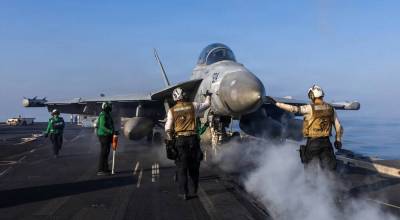 U.S. Navy photo. An EA-18G Growler, attached to Electronic Attack Squadron (VAQ) 133, prepares to launch from the flight deck of Nimitz-class aircraft carrier USS Abraham Lincoln in support of Operation Epic Fury on March 2.