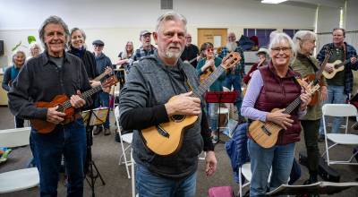 Photo by David Welton. A large group of strummers attended a recent ukulele class at Create Space Langley.