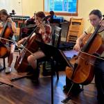 Photo by Patricia Guthrie. Students practice the cello.