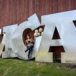 Photo by David Welton. A large metal sign outside of WICA is unmistakable from far away.