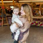 Francesca Coenen-Winer, owner of the Old Soul Bazaar and Bayview Corner Taproom inside the Old Soul Bazaar with her daughter on March 12, 2026 in Langley. (Olivia Vanni / The Herald)