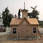 Photo by David Welton. Volunteers assembled, roofed, painted and decorated the Star Barn chapel at the western-themed town at M-Bar-C Ranch in Freeland.