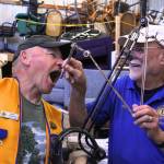 Photo by Allyson Ballard. Two items will be auctioned off at the Coupeville Lions Clubs garage sale this year: a mini slot machine, and a dental chair with a drill.