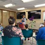 Photo by Cassandra Diamond. Urban farmer Lisa Taylor teaches children about garden critters during an event held at the Coupeville Library on Wednesday.