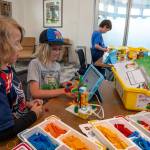 Photo by David Welton. Sebastian Alder and Walden Miller create a masterpiece with Legos at the Langley Library.
