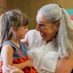 Photo provided. Jane Bothel, the executive director for Mother Mentors and a longtime mentor, cheeses as she chaperones a young girl.