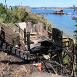 (Photo by Allyson Ballard) What caused the remnants of a relocated historic building to burn in Coupeville early Sunday morning is still unknown, but remains of fireworks were found nearby.