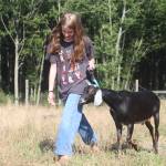 Photo by Marina Blatt. Lina Moreno has spent half of her life building trust with her dairy goats. She will show four dairy goats and another in the pack event, where goats navigate teeter-totters, tires and weaving courses that require months of training.